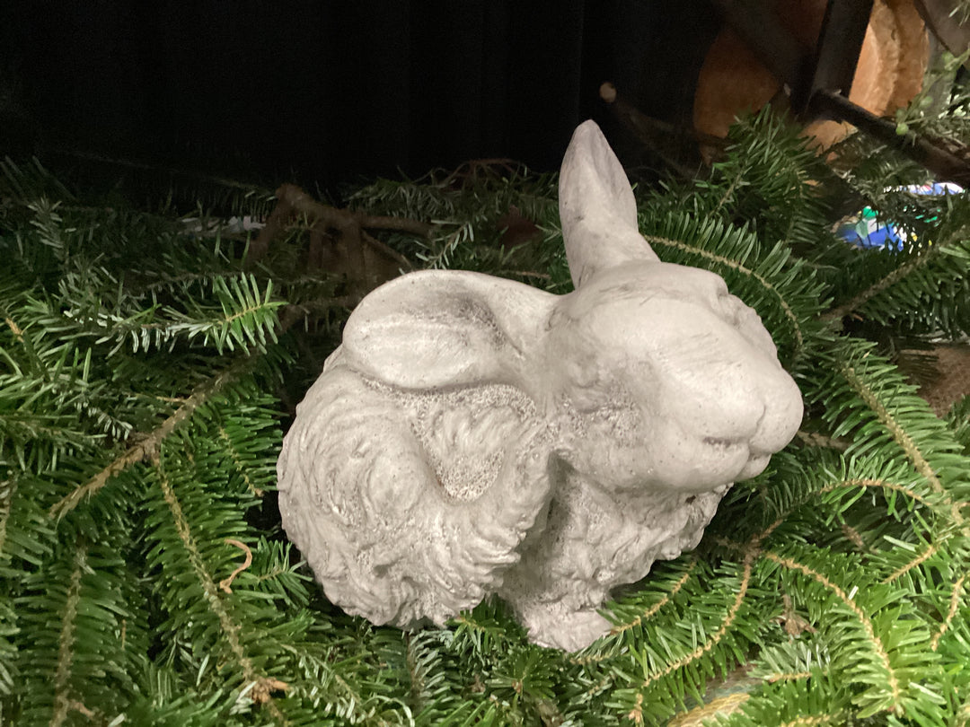 Rabbit scratching sculpture