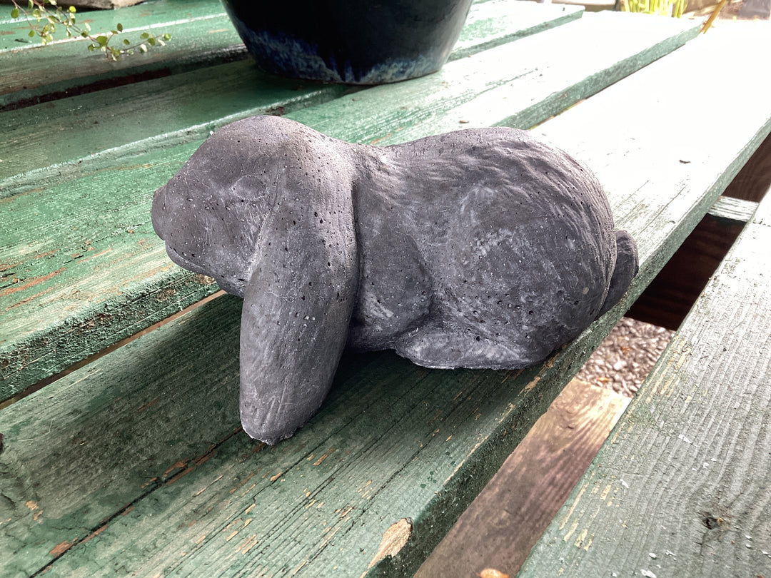 Garden sculptures: small blue bunnies